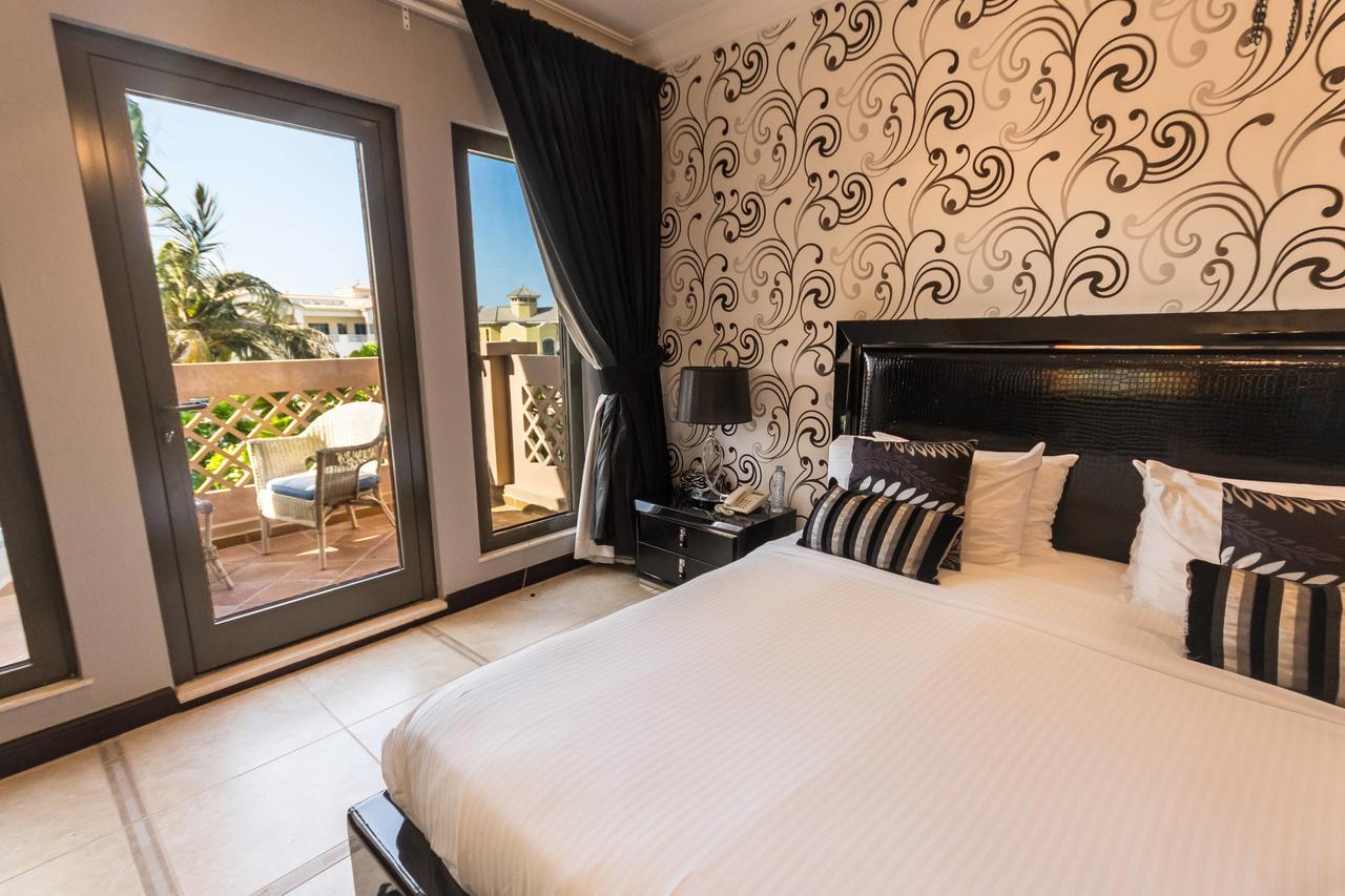 Yanjoon Holiday Homes - Palm Jumeirah Frond A Villas Dubai Eksteriør billede